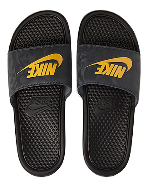 Nike benassi slides mens - Slide into comfort in the lightweight and sporty Nike Benassi JDI Slide. It features the Nike logo on the foot strap, which is lined with super-soft fabric.
